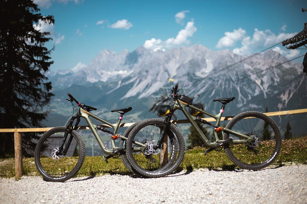 Photo by Daniel Frank Bicycles Parked beside the Wooden Fence